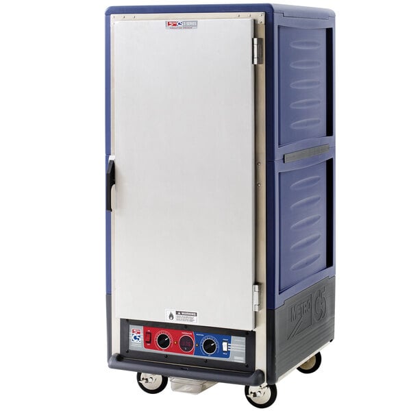 A blue Metro C5 series heated holding and proofing cabinet with a solid door and wheels.
