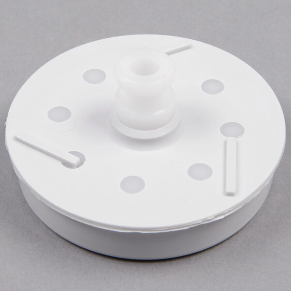 A white plastic Cecilware Gentle Agitation Impeller with holes.