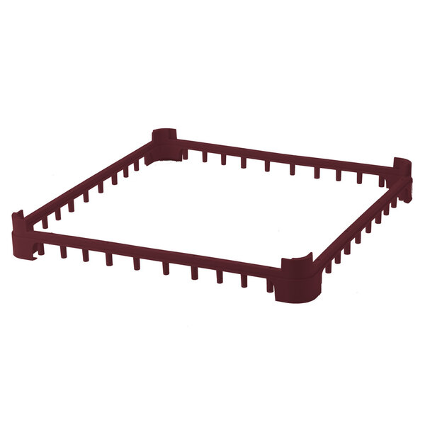 A burgundy plastic Vollrath extender with holes.