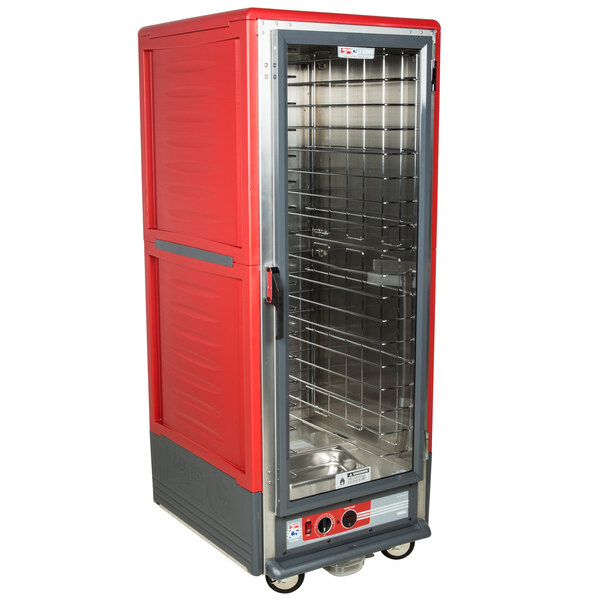 A red and silver Metro C5 hot holding cabinet with a clear door.