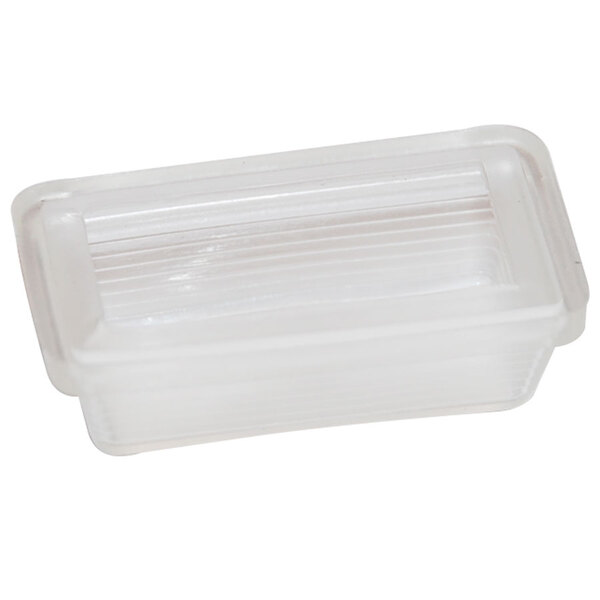 A clear plastic Cecilware rocker switch cap on a white surface.