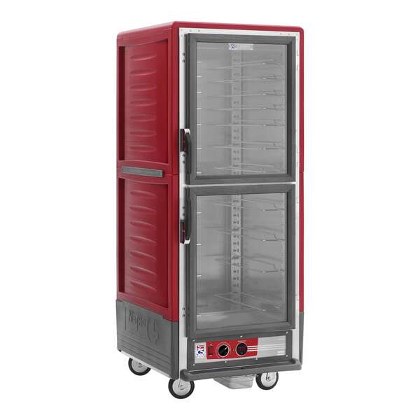 A red Metro C5 hot holding cabinet with clear Dutch doors.