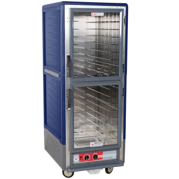 A large blue Metro C5 hot holding cabinet with clear Dutch doors.