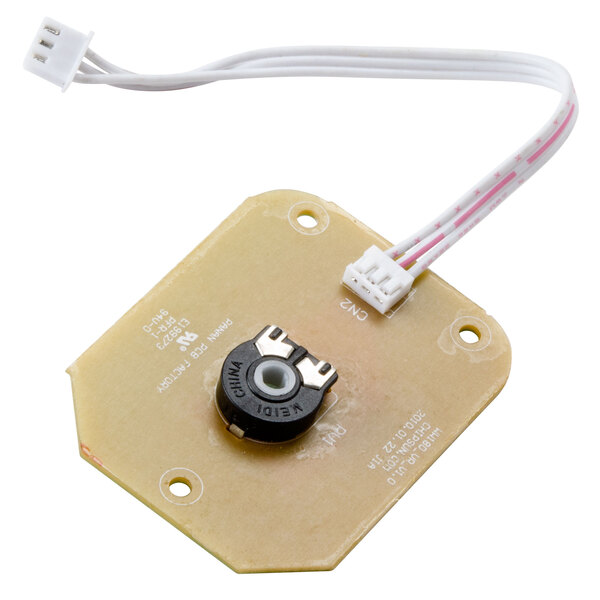 A small electronic Waring thermostat with wires attached to it.
