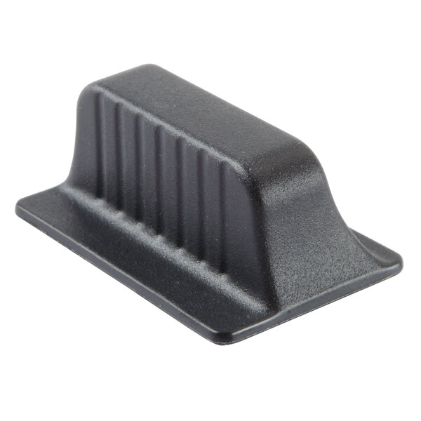A black plastic control lever for a Waring commercial toaster.