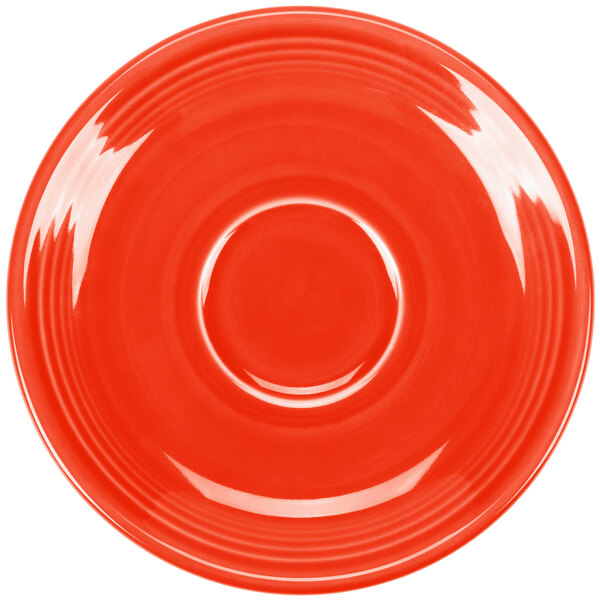 A Fiesta Poppy saucer with a red circle.