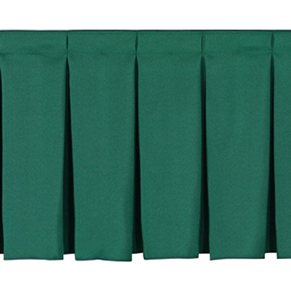 A green pleated skirt for a National Public Seating stage.