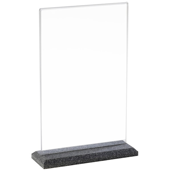 A clear acrylic sign on a black granite base.