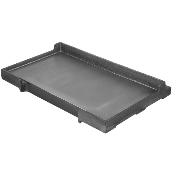 A black rectangular grill plate with a handle.