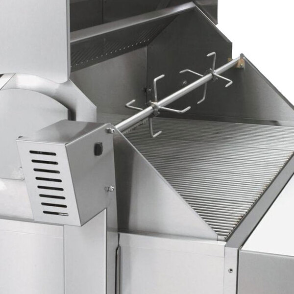 A close-up of a Crown Verity built-in grill with a rotisserie assembly.