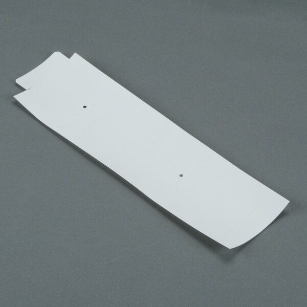 A white rectangular plastic sheet.