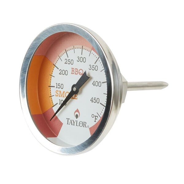 A close-up of a Taylor grill/smoker thermometer with a red and orange dial.