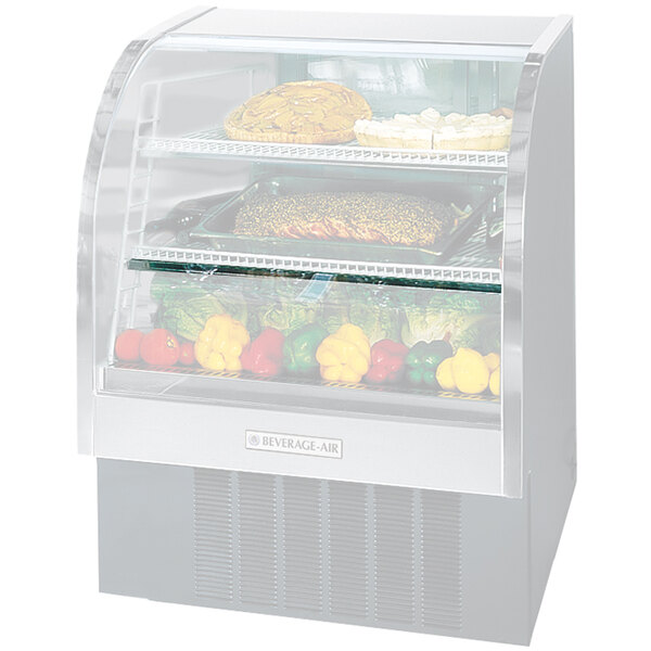 The Beverage-Air shelf light installed in a curved glass refrigerated display case full of food.