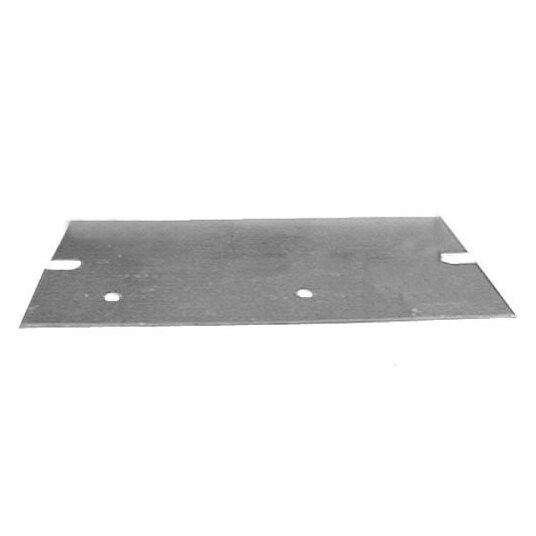 A metal plate with holes on a black surface.