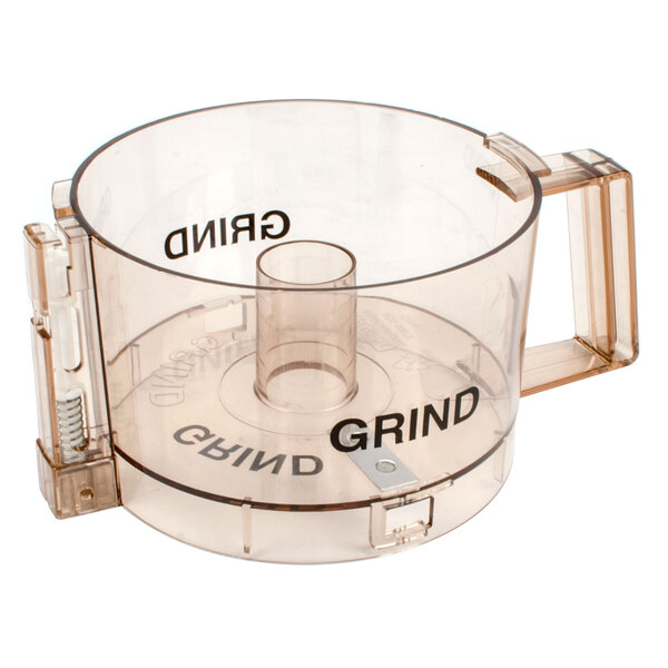 A clear plastic bowl with black text that says "grindz" on the counter.