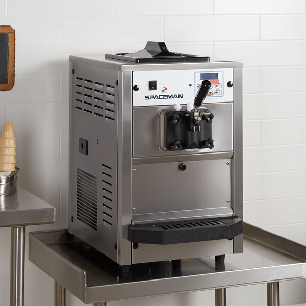 A Spaceman commercial soft serve ice cream machine on a counter.