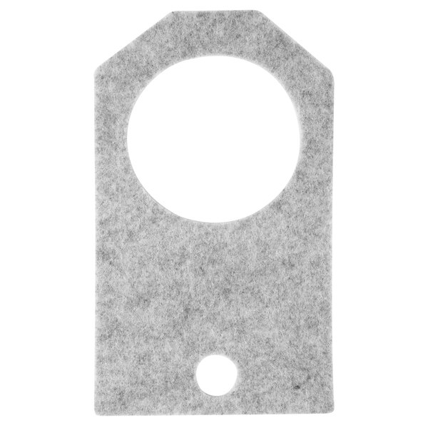 A gray felt pad with a white circle in the center.
