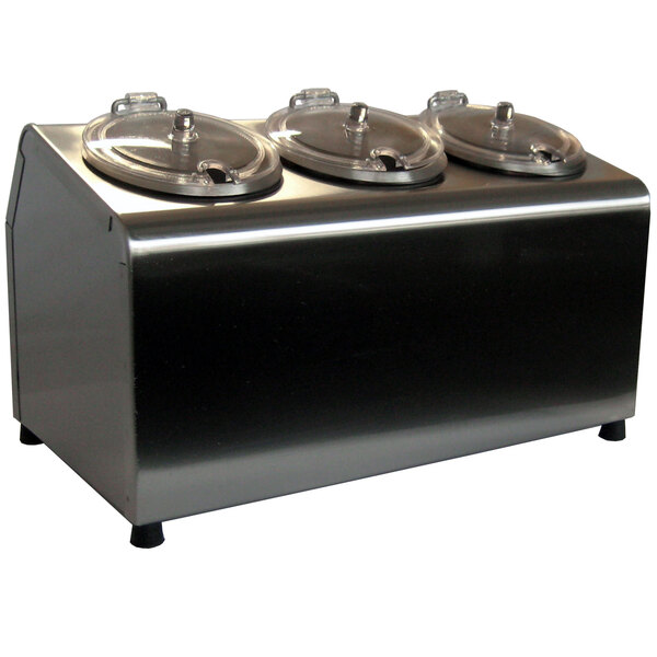 A Steril-Sil stainless steel three compartment condiment dispenser on a counter with three stainless steel containers with lids.