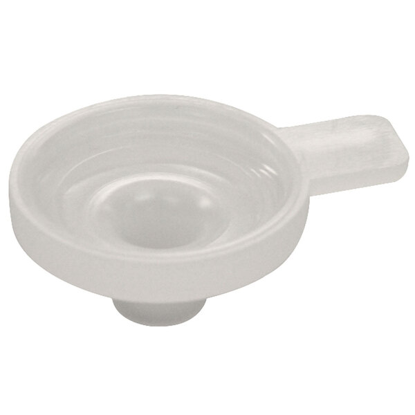 A clear plastic Cecilware restrictor cap with white plastic funnel and measuring cup.