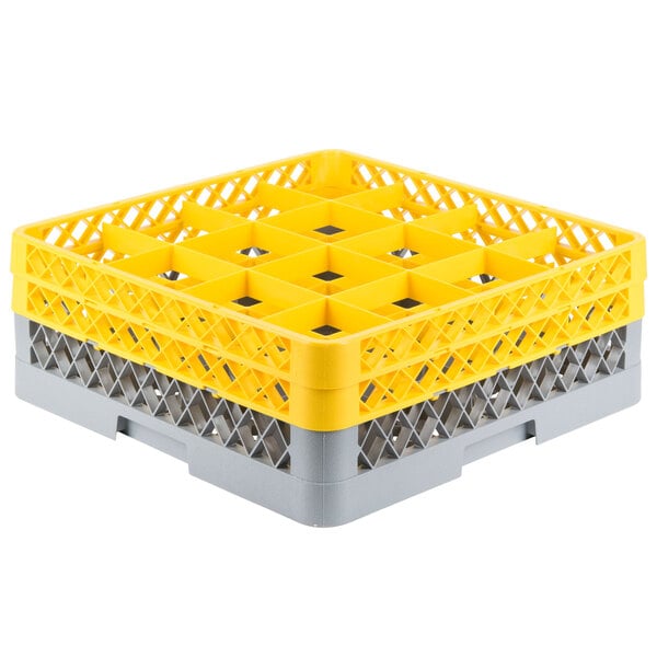 A gray and yellow plastic Noble Products glass rack with 16 compartments.