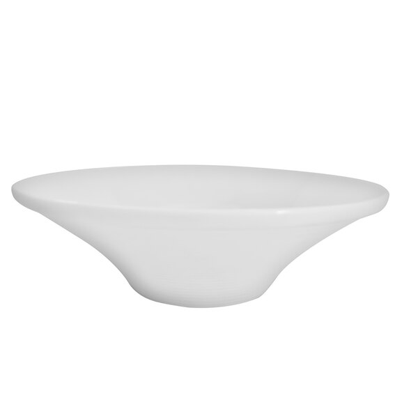 A CAC bright white porcelain tulip bowl with a curved edge on a white background.