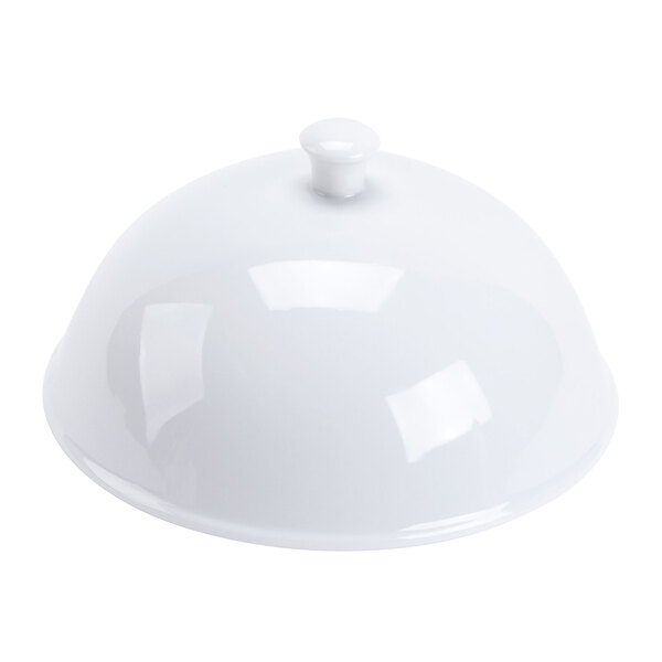 A white porcelain lid with a dome shape covering a white square plate.