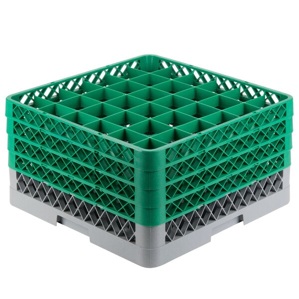 A grey plastic glass rack with green plastic extenders.