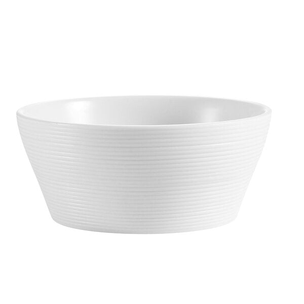 A close up of a CAC bright white porcelain bowl.