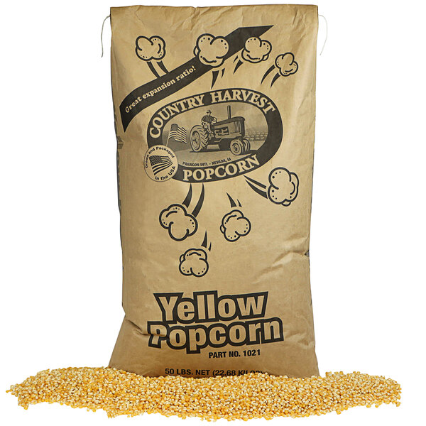 A large bag of Paragon Country Harvest yellow butterfly popcorn kernels.