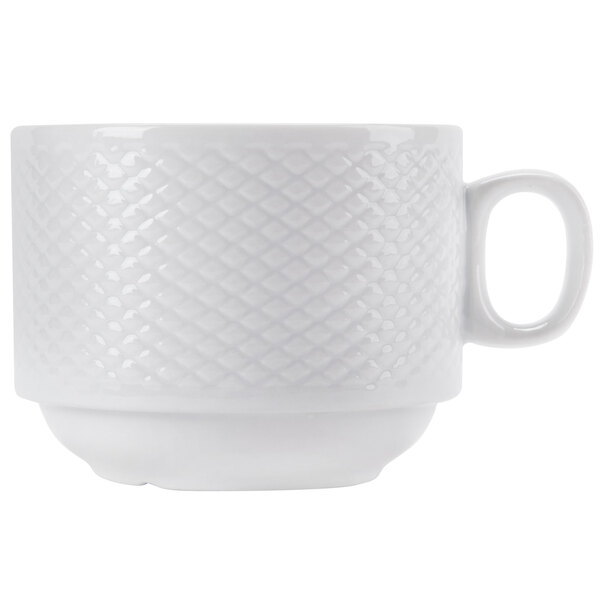 A close up of a CAC Boston Super Bright White Stacking Cup with an embossed design.