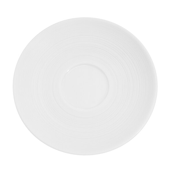 A CAC Transitions bright white porcelain saucer with a circular edge.