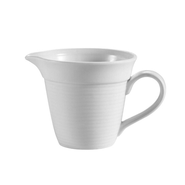 A CAC Harmony white porcelain creamer with a handle.