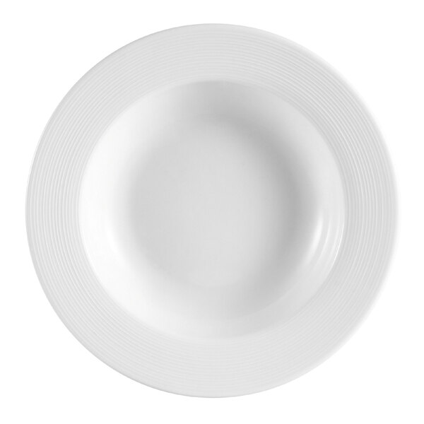A CAC white porcelain pasta bowl with a circular design.