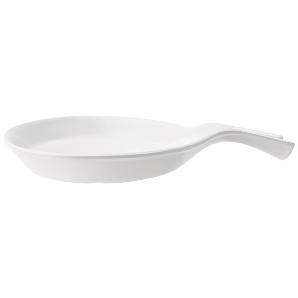 A white round skillet with a handle.
