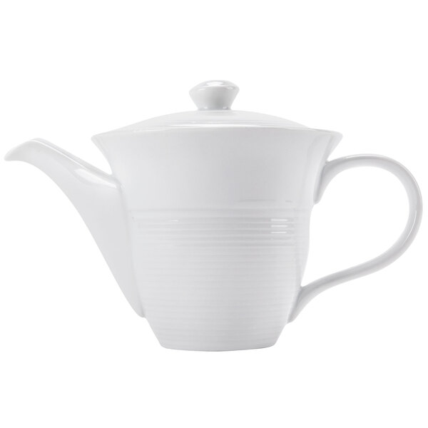 A CAC white porcelain teapot with a handle.