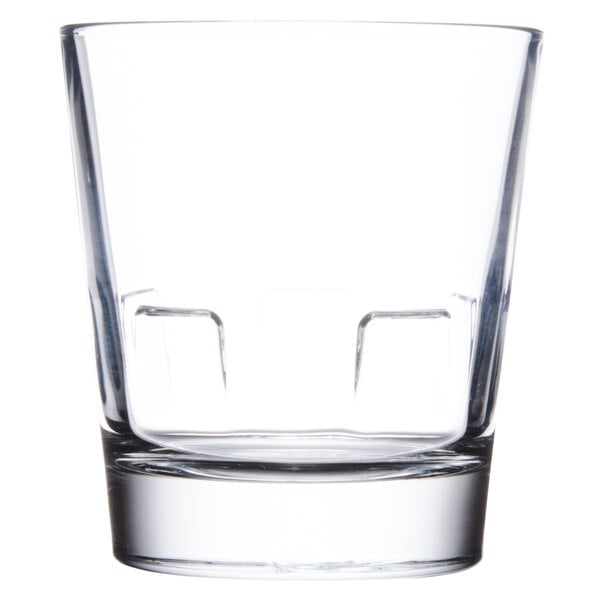 A close up of a clear Libbey stackable rocks glass.
