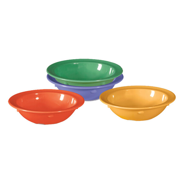 A group of GET Mardi Gras monkey dishes in assorted colors.