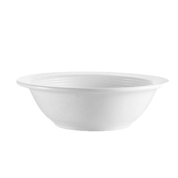 A CAC Harmony white porcelain grapefruit bowl with a white background.