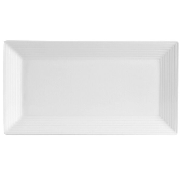 A white rectangular porcelain platter with a thin white border.