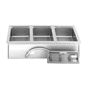 A Wells 3 pan drop-in hot food well with a stainless steel countertop.