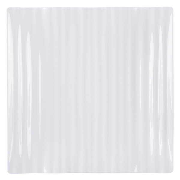 A white square GET Polynesian plate with wavy lines.