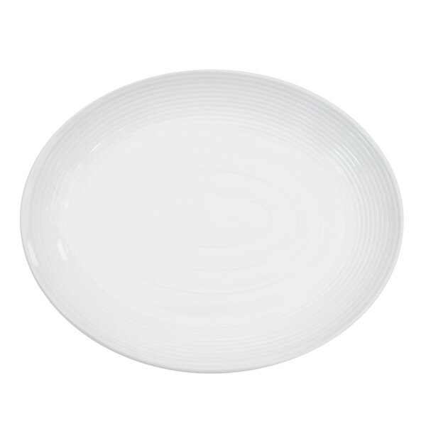 A white porcelain platter with a thin rim.