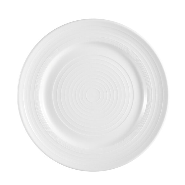 A CAC Tango bone white porcelain plate with a spiral pattern.
