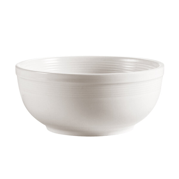 A CAC bone white porcelain bowl with a handle.