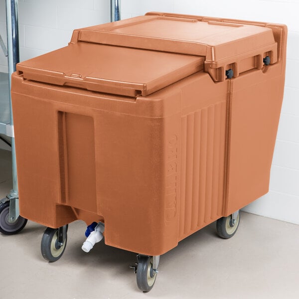 A large plastic container with wheels for ice.