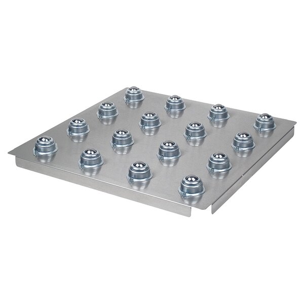 A metal plate with silver balls on it.