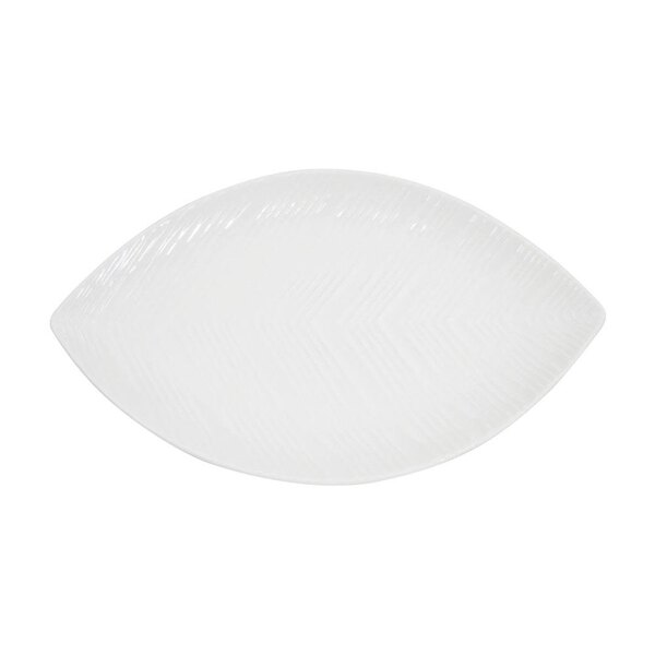 A white porcelain leaf dish with a pattern of leaves.