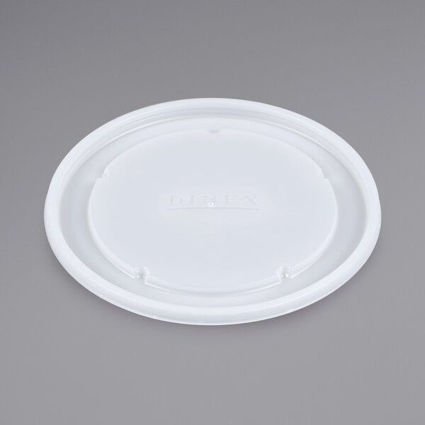 A white plastic lid with the Dinex logo on it.