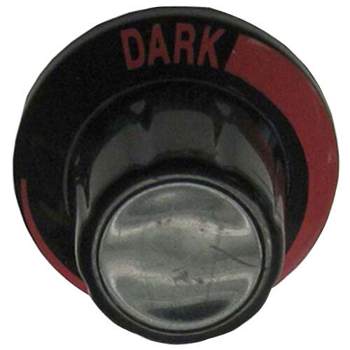 A black and red control knob with the word "dark" in red.