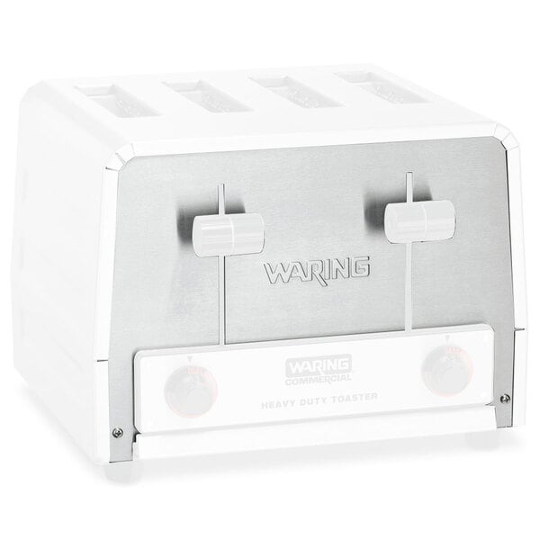 The front cover plate for a white Waring toaster with knobs.